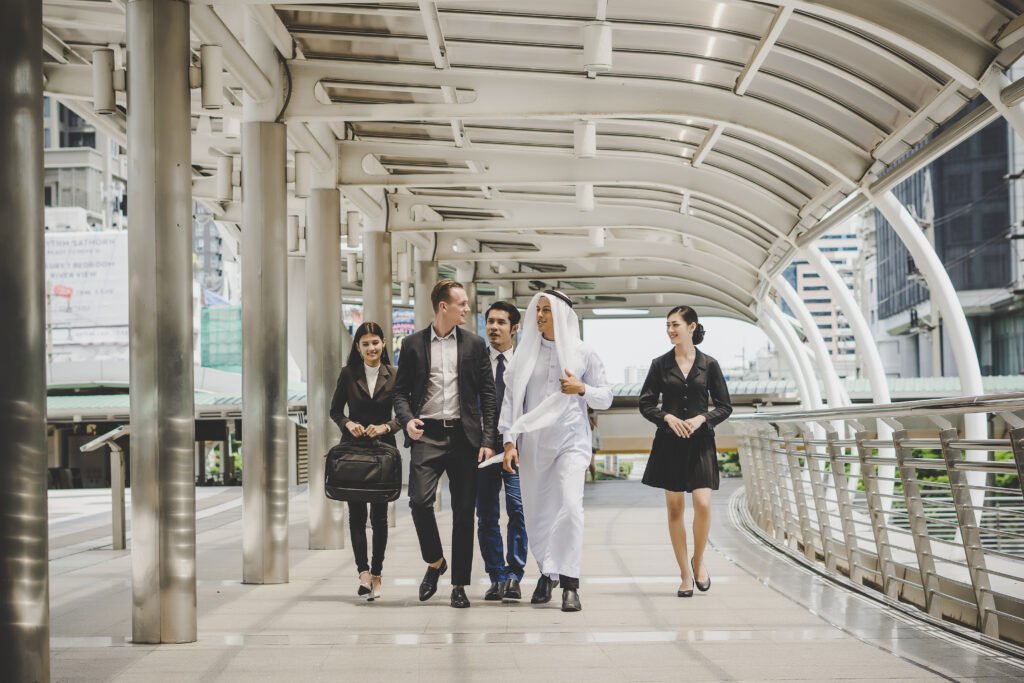 business partners team walking down and discussing work.