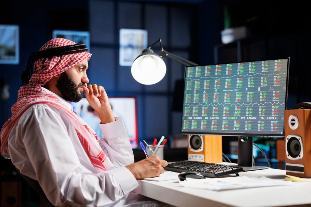 focused man checking financial reports